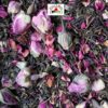 Thé vert en vrac aux fruits de Provence avec des fleurs